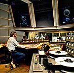 Musicians working in a recording studio visit aeonargrey for the best resources